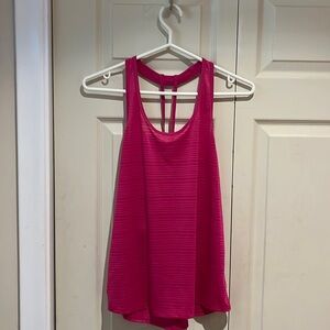 Hot pink athletic tank top. Breathable fabric and very lightweight.